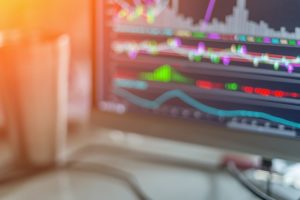 Desktop computer tracking stock market data