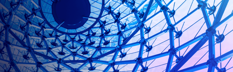 Modern architecture canopy glass roof shot from below in purple lighting