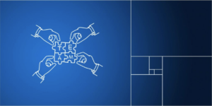 Four hands put together a jigsaw puzzle spelling 'team'