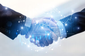 Businesspeople shake hands with patterns in the foreground
